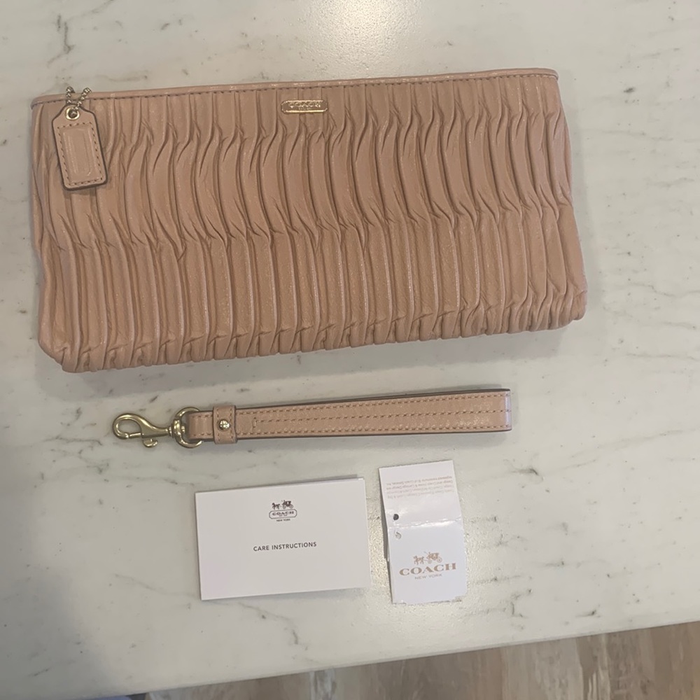 Coach Madison gathered leather zip wristlet clutch in color cappuccino.
